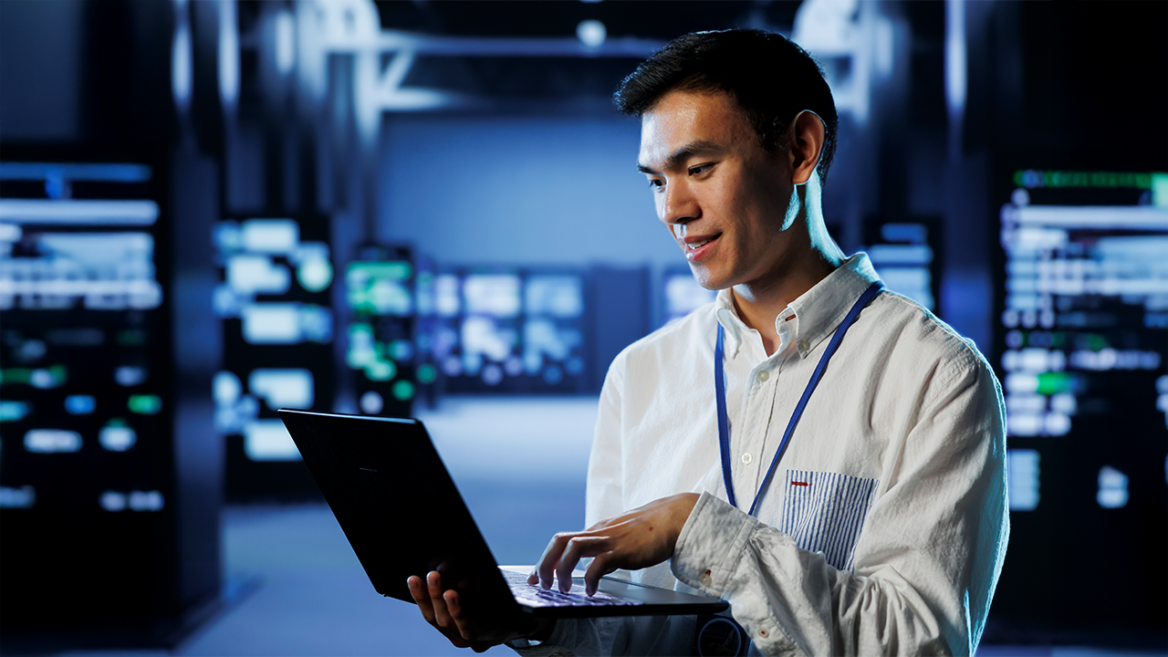 Business professional managing cloud applications on private and hybrid cloud platforms